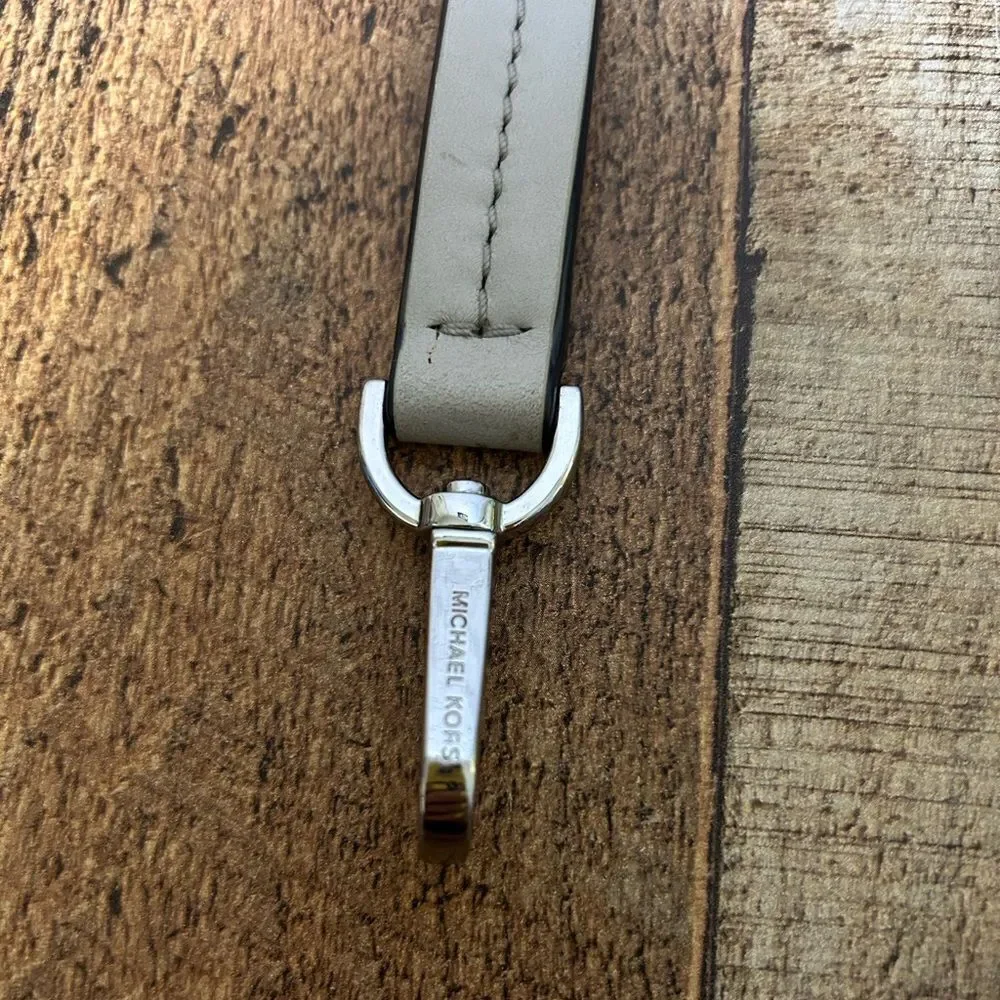Michael Kors cream color replacement leather strap and lock bag charm